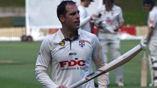 Sydney University keeper Tim Cummins scores a century against Northern Districts. Supplied Images