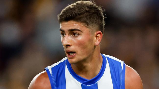 MELBOURNE, AUSTRALIA - APRIL 21: Harry Sheezel of the Kangaroos in action during the 2024 AFL Round 06 match between the North Melbourne Kangaroos and the Hawthorn Hawks at Marvel Stadium on April 21, 2024 in Melbourne, Australia. (Photo by Dylan Burns/AFL Photos via Getty Images)