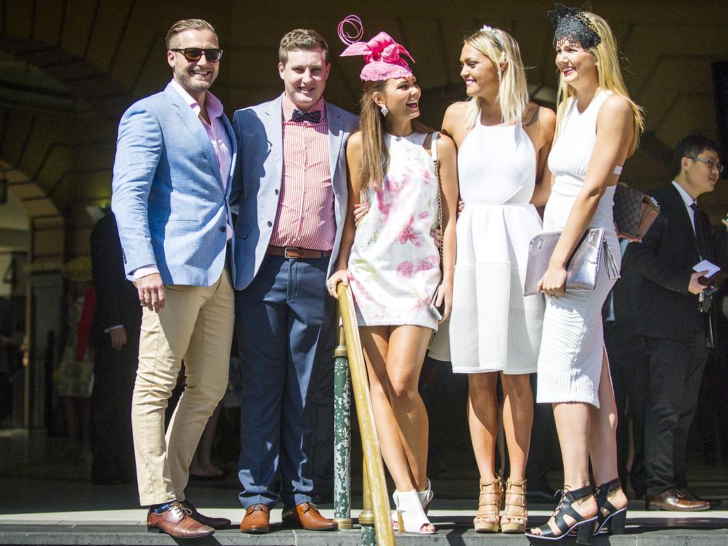 (L-R) Ryan Dreves, Robert Dreves, Meg Bedgood, Maddi Bruce and Shelly Rosanoff on the steps at Flinders Street Station. Picture: Eugene Hyland