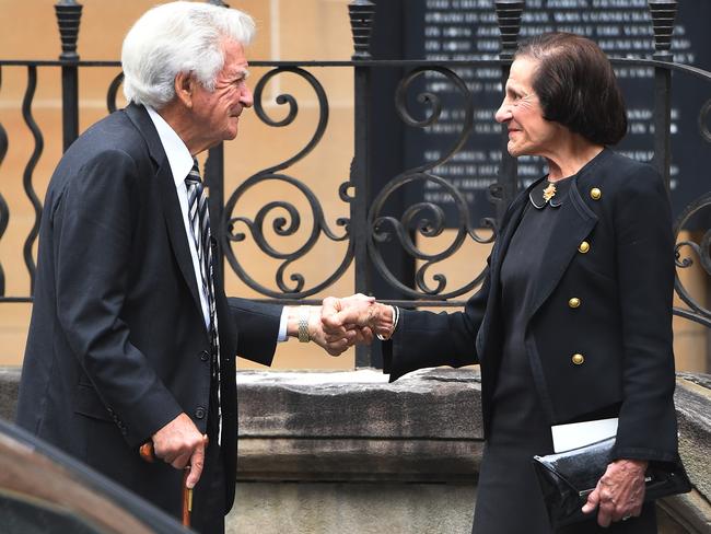 Former PM Bob Hawke comforts Marie Bashir following the State Funeral. Picture: AAP/Dean Lewins