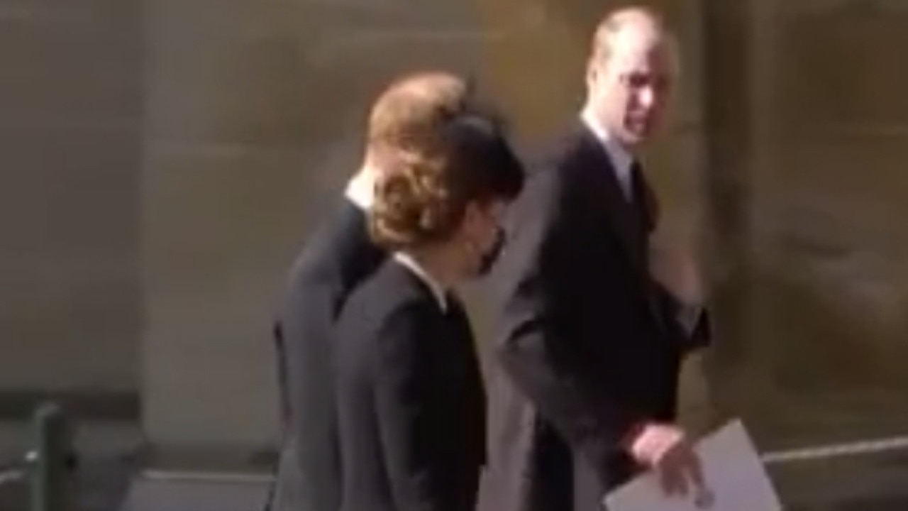 Prince Harry and Prince William walking together after the funeral service with Kate, who later dropped out to let the brothers talk. Picture: 7NEWS.