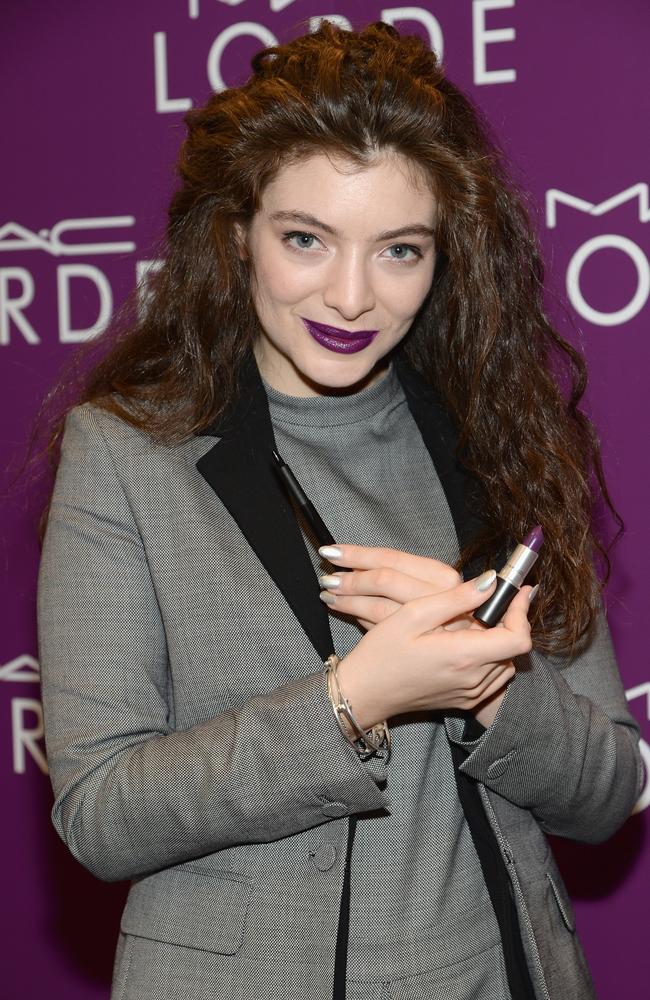 Lorde with the two MAC products she collaborated on.