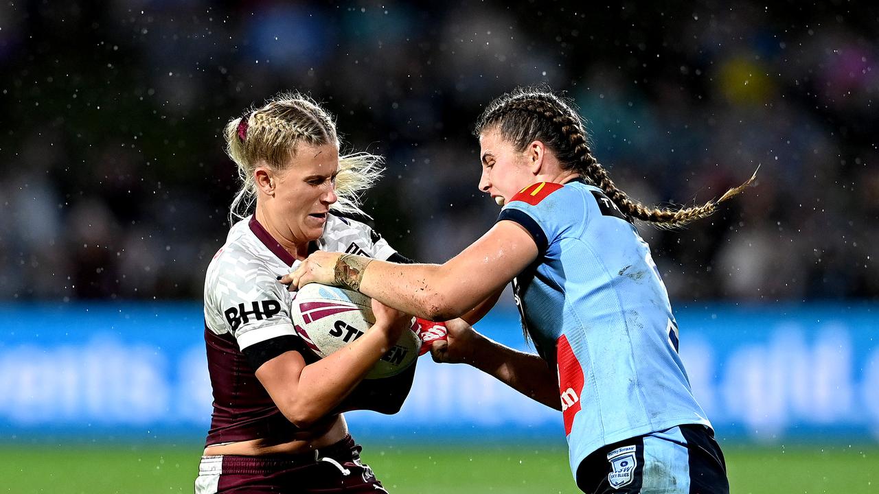 Shenae Ciesiolka of Queensland attempts to break away from the defence of Jessica Sergis of New South Wales during the Women's Rugby League State of Origin match at the Sunshine Coast Stadium on June 25, 2021. Picture: Getty Images