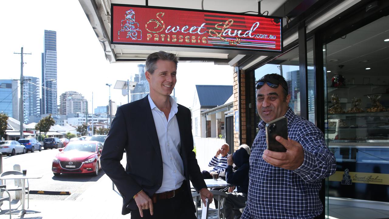 Andrew Charlton talks to locals in Harris Park. Picture: Britta Campion