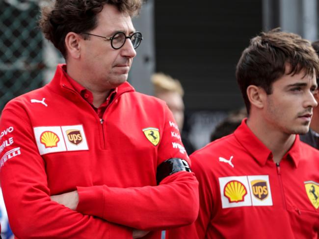 Ferrari's team chief Mattia Binotto and Ferrari's Monegasque driver Charles Leclerc.