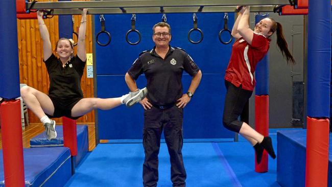 Ruby Johnson, Sgt Greg Jones and Amy English on the new ninja frame at the PCYC in North Rockhampton. Picture: Jann Houley