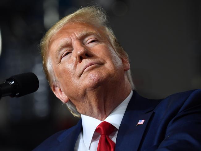 (FILES) In this file photo taken on August 15, 2019, US President Donald Trump speaks during a "Keep America Great" campaign rally at the SNHU Arena in Manchester, New Hampshire. - US President Donald Trump lashed out at Beijing and vowed a quick response to China's plans for new tariffs, while ordering American companies to leave the country. The blistering Twitter screed called into doubt chances for a quick resolution to the escalating trade war between the world's economic superpowers, which by the end of the year will cover nearly all imports and exports exchanged between the two countries. "We don't need China and, frankly, would be far... better off without them, Trump said. (Photo by Nicholas Kamm / AFP)