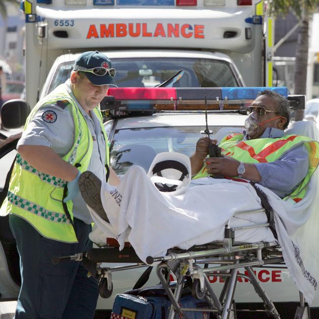 Gas Leak Ferny Avenue, Surfers Paradise in front of 50 Cavill Avenue. A traffic controller is over come by gas fumes.