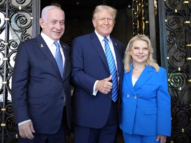 Israeli Prime Minister Benjamin Netanyahu (L) and his wife Sara (R) being welcomed by former US President Donald Trump at the Mar-a-Lago Club in Palm Beach, Florida, on July 26, 2024. Picture: Israeli Government Press Office / AFP