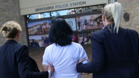 Stacey Kelly Greenup (centre) is the sixth person to be charged with the death of Vergel Velasquez at his Girraween unit block where he was viciously attacked on December 30.