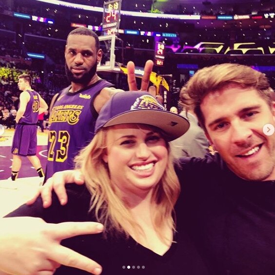 LeBron James photobombs Rebel Wilson’s courtside selfie with Hugh Sheridan. Picture: Instagram.