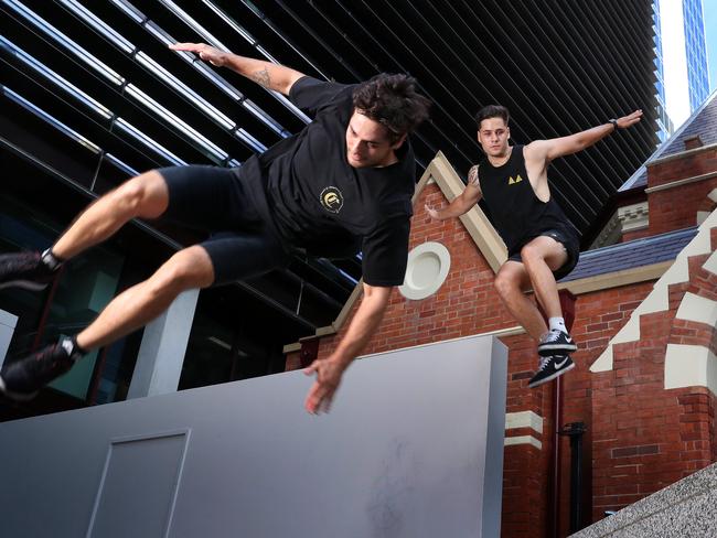 WARNING Embargo for QLD Sunday Mail - March 7 2021. Brisbane parkour twins Brodie and Dylan Pawson, Brisbane CBD. Photographer: Liam Kidston.