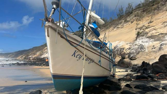 Stills of a video put together by Clayton's Towing showing their rescue of a yacht on Rainbow Beach. Photo: contributed