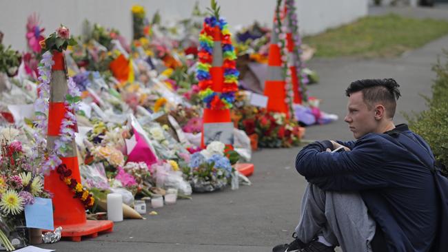 Flowers have been placed outside mosques in New Zealand and Australia, a sentiment that’s appreciated but has the potential to force a burden on the Muslim community to absolve grief and guilt. Picture: AP/Vincent Yu