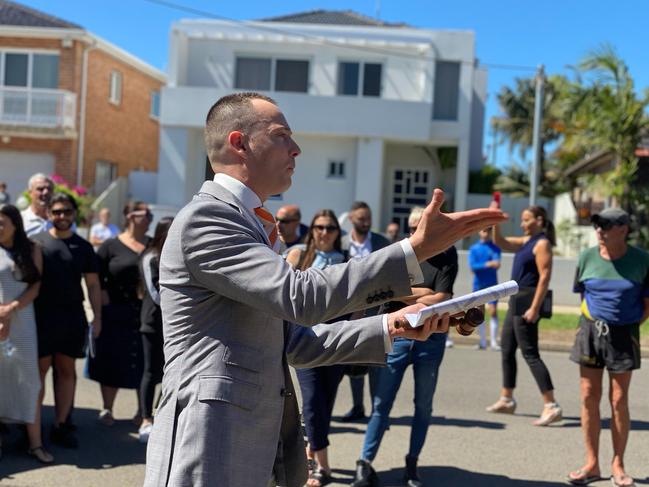 Auctioneer Andrew Cooley at a Kyeemah property that sold for $440,000 over reserve. NSW real estate.