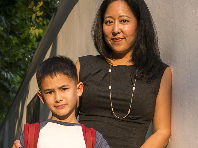 05-09-17 - Portrait of Lenora Chu and her eight hear old son, Rainey in Shanghai. Picture By Dave Tacon/The AustralianSeptember 5, 2017, Shanghai, China - Texas born journalust and author Lenora Chu with her eight year old son Rainey, near their home in the Former French Concession. Chu is the author of Little Soldiers, an exploration of China's education system and her concerns for its teaching of Chinese Communist Party ideology to students of all age levels.