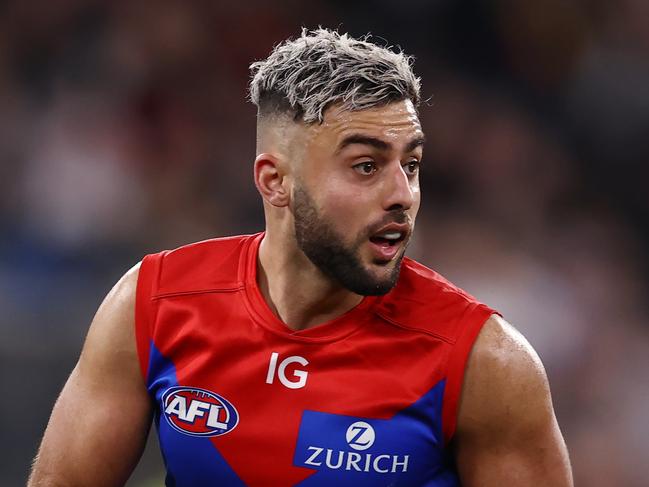 MELBOURNE, AUSTRALIA - Augus 12 , 2023. AFL .      Christian Salem of the Demons during the round 22 match between Carlton and  Melbourne at the MCG in Melbourne.   Photo by Michael Klein.