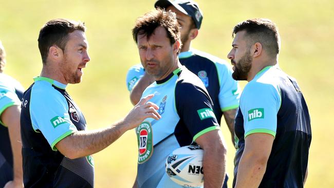 James Maloney talks to Josh Mansour as Laurie Daley looks on during warm up for the NSW Blues Origin team training session at the Novotel Pacific Bay Resort , Coffs Harbour .Picture : Gregg Porteous