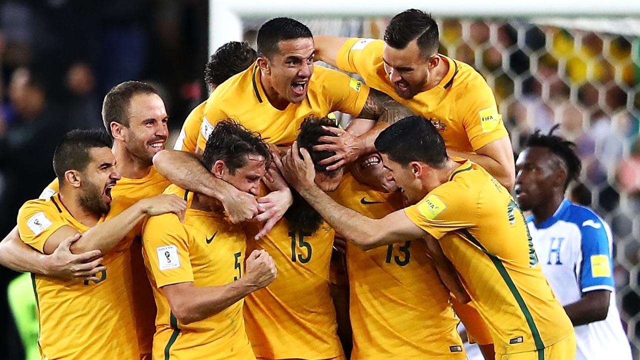 Australia celebrates after scoring a goal against Honduras.