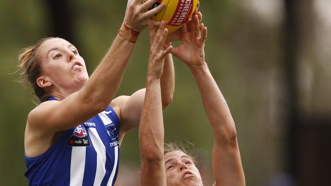 Emma King flies for a contested mark against Adelaide. Picture: AAP