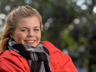 The Autumn wind is ready to arrived and Anneliese Hinchliffe is rugged up for the cold in Memorial Park, Gympie. Picture: Patrick Woods