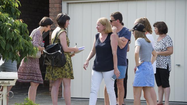 North East link representatives speak to residents in Boyd Street Greensborough. Picture: Jason Edwards