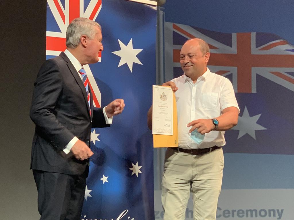 Antonio Minana-Falco, originally from Spain, receives his certificate of citizenship at the MECC on Australia Day, 2022. Wednesday, January 26, 2022. Mackay Australia Day 2022. Mackay Citizenship Ceremony 2022. Picture: Duncan Evans