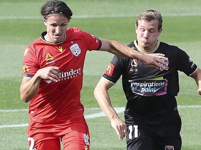 SOCCER - A-LEAGUE - Adelaide United v Newcastle Jets at Coopers Stadium. Michael Marrone and Nicholas Fitzgerald Picture SARAH REED