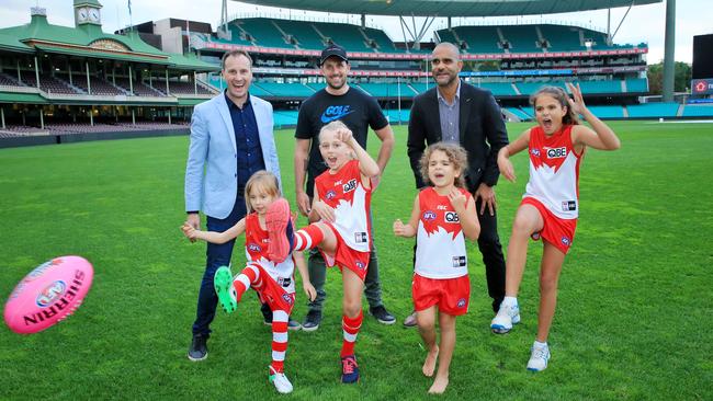 Jude Bolton with daughter Siarra, Nick Davis and daughter Jordan and Michael O'Loughlin with daughters Taya and Leni at the SCG. Picture: Mark Evans