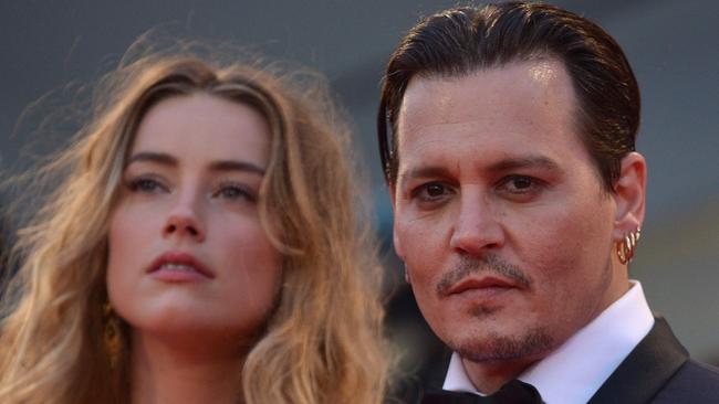 Amber Heard and Johnny Depp when they were together. Picture: Tiziana Fabi/AFP