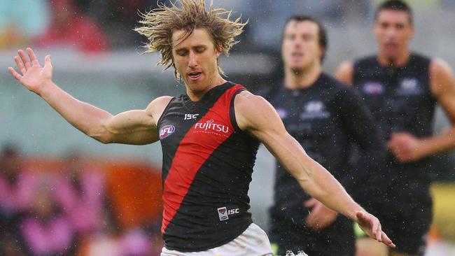 Dyson Heppell kicks Essendon into attack against Carlton.