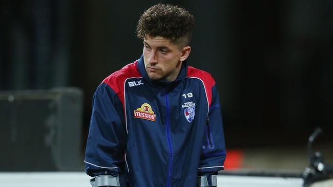 Tom Liberatore on crutches. Picture: Getty Images