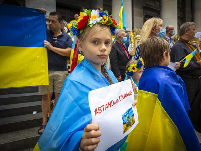 ADELAIDE, AUSTRALIA - Advertiser Photos FEBRUARY 20, 2022: A young Ukrainian supporter Olia Guseva 9yrs at The Association of Ukrainians in South Australia rally in support of Ukraine on Sunday 20th February 2022 outside Parliament House, SA. Picture Emma Brasier