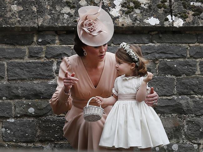 Princess Charlotte has experience as a flower girl for her Auntie Pippa, Kate Middleton’s sister. Picture: AFP/ KIRSTY WIGGLESWORTH
