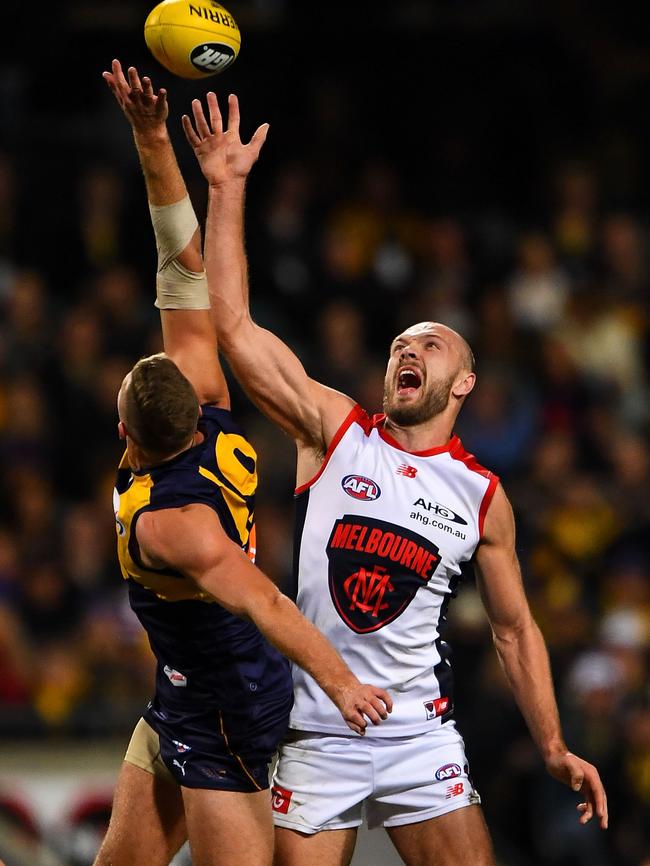 Nathan Vardy and Max Gawn jump for the ball.