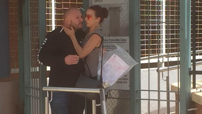 Hells Angels bikie Samuel King leaves Southport Watchhouse with his partner. Picture: Jack Harbour.