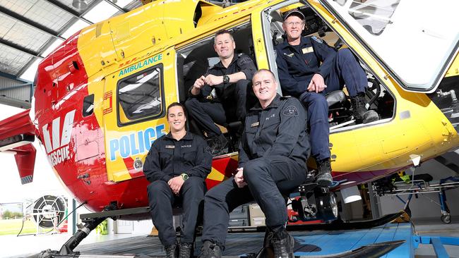 Westpac Rescue Helicopter crew members Ingrid Pajak, left, Chris Williams, Rod Stacey and Dave Clark at Rotorlift in Cambridge. Picture: SAM ROSEWARNE