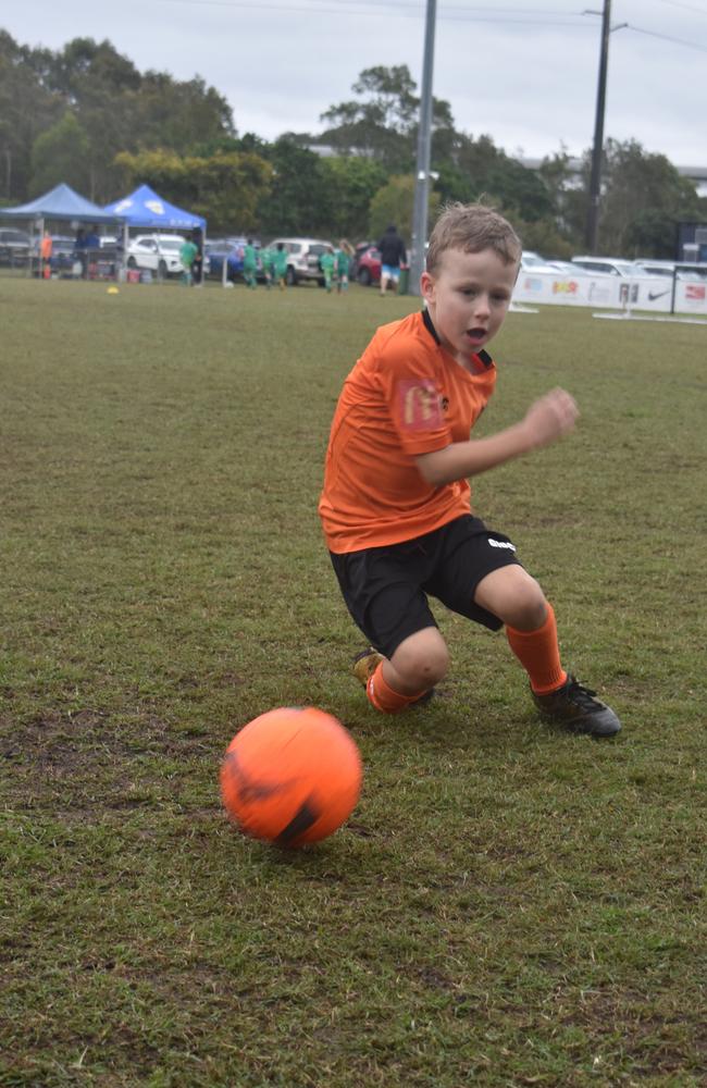 Buderim under 7s players going through some warm-up drills at the Morey Tonen Carnival at Kawana on August 13, 2022. Picture: Eddie Franklin.