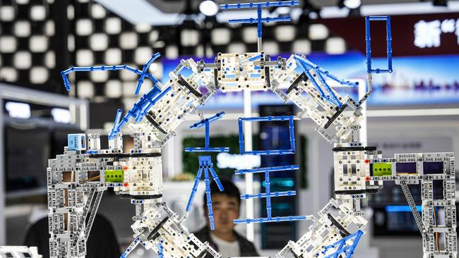 People visit the World Artificial Intelligence Conference (WAIC) in Shanghai on July 4, 2024. (Photo by AFP) / China OUT