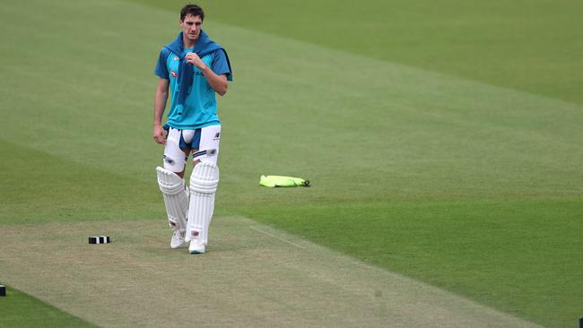 Australian captain Pat Cummins inspects the pitch on the eve of the World Test Championship final at The Oval in London Picture: Getty Images