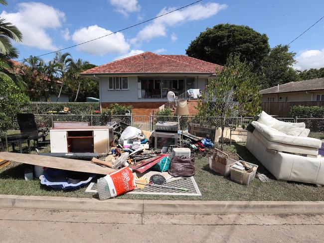 Residents were urged to leave flood-damaged items outside houses for kerbside collection by March 2. Picture: Liam Kidston.