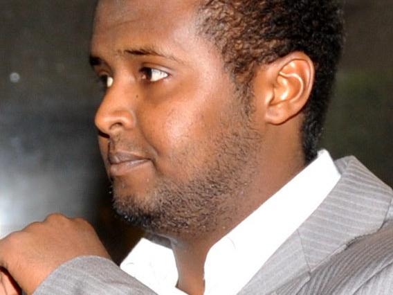 **FILE** A Thursday, Dec. 23, 2010 file photo of Yacqub Khayre leaving court in Melbourne. The gunman at the centre of Monday night's Melbourne hostage attack has been named in the media as Yacqub Khayre who was acquitted over the Holsworthy terror plot in 2009. (AAP Image/Julian Smith) NO ARCHIVING