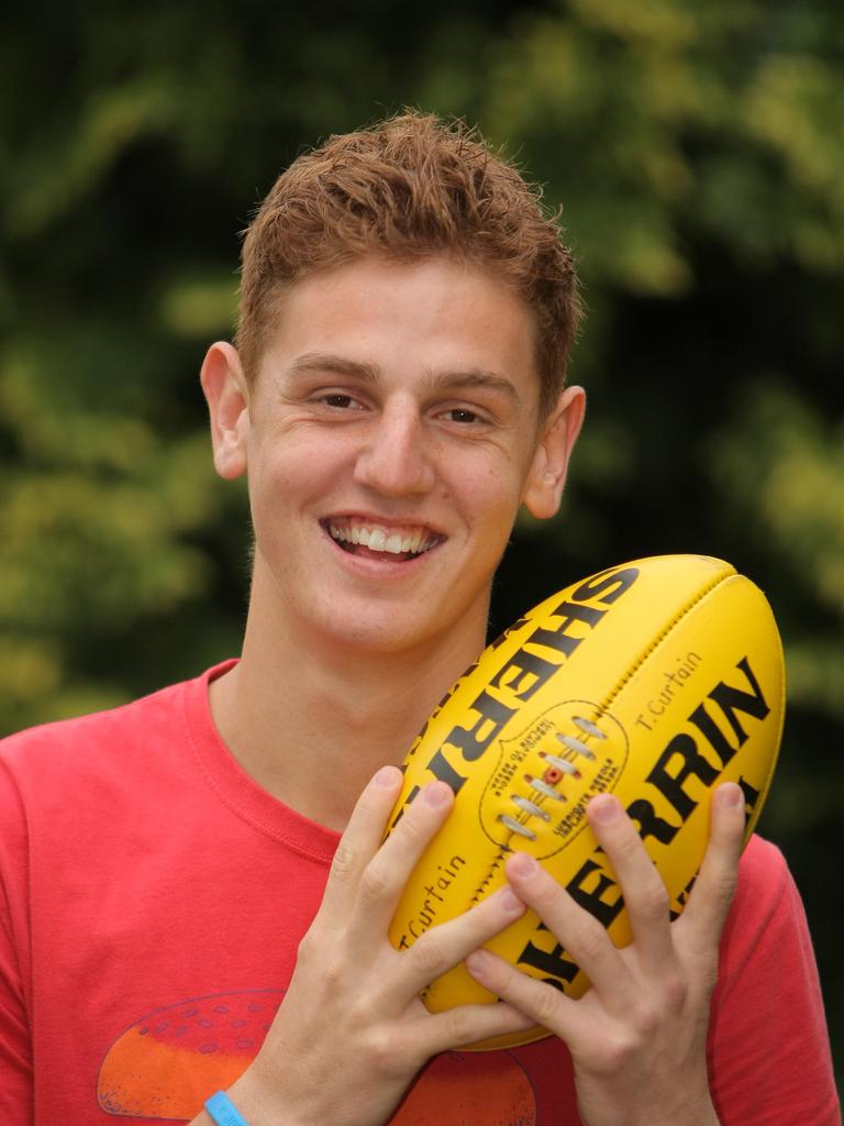 Liam Jones, aged 17, after his name was called by the Western Bulldogs on draft day.