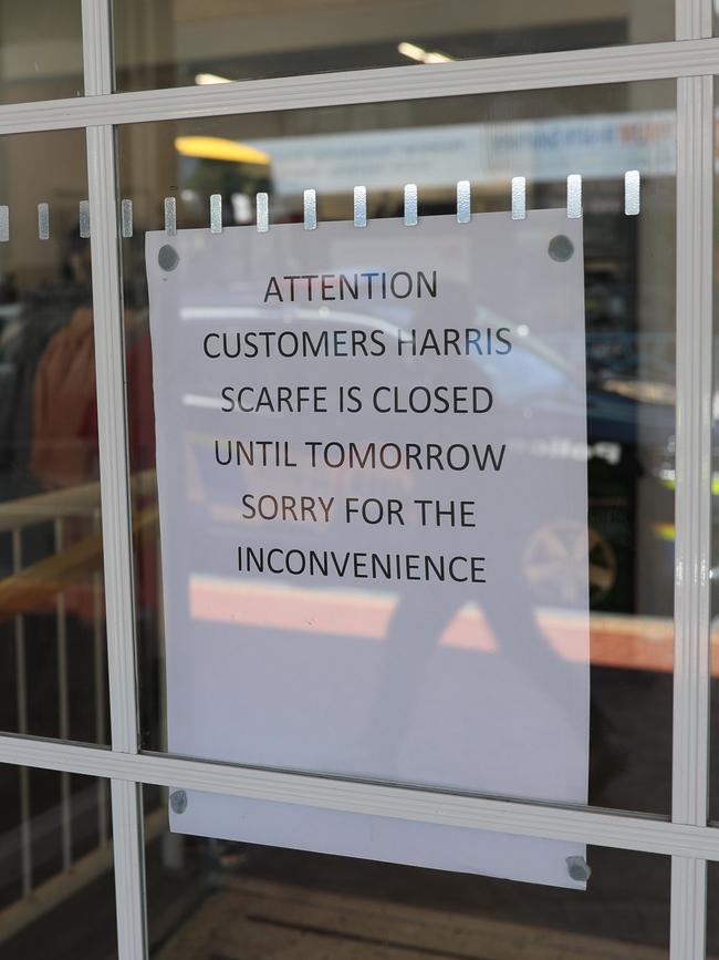 A sign on the door to customers of Harris Scarfe Moonah. Picture: Mireille Merlet