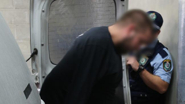 A man arrested during the raid by Strike Force Pallamana detectives in the Hunter Valley