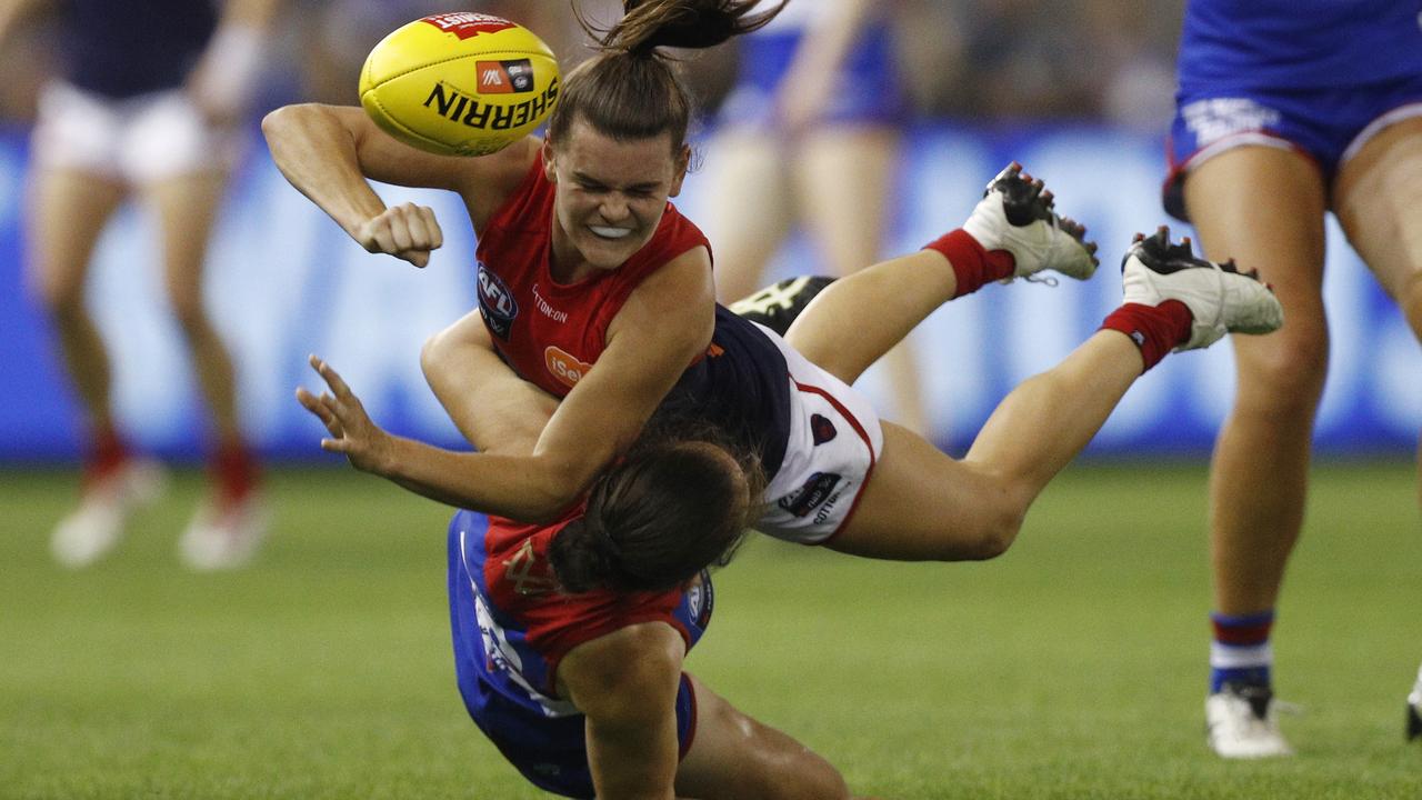 Lily Mithen is tackled by Naomi Ferres.