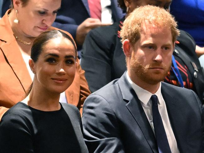 (FILES) Prince Harry (R) and Meghan Markle (L), the Duke and Duchess of Sussex, attend the 2020 UN Nelson Mandela Prize award ceremony at the United Nations in New York on July 18, 2022. A multi-million-dollar deal between a media group run by Britain's Prince Harry and his wife Meghan Markle, and streaming giant Spotify is to end, a report said June 15, 2023. (Photo by TIMOTHY A. CLARY / AFP)