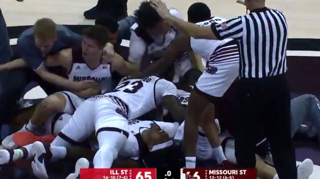 Players from Missouri hit the floor to celebrate an epic win.