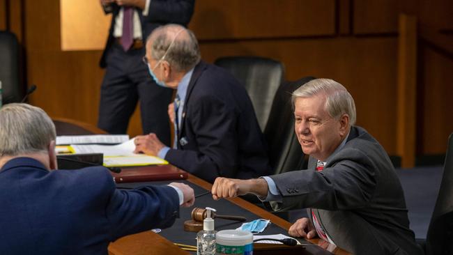 Senator Lindsay Graham, right.