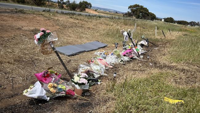 A roadside memorial for a Buckland Park teen killed in a crash in Adelaide's north has grown to several metres as loved ones continue to pay tribute. Picture: Natalie Vikhrov